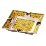 Decorative ceramic ashtray with yellow and blue floral pattern