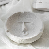 Pout face expression ceramic ashtray in white, artistic minimalist style