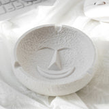 Gentle Smile face expression ceramic ashtray in white, modern decorative ashtray