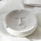 Sassy face expression ceramic ashtray in white, stylish minimalist ceramic ashtray