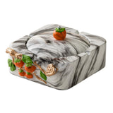 Lidded ceramic ashtray with persimmon accent, marble-look finish, removable lid and square covered design