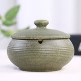 Sage green matte ceramic ashtray with lid round zen minimalist design