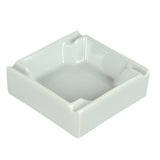 Ivory white ceramic ashtray and 4 grooves to rest cigarettes