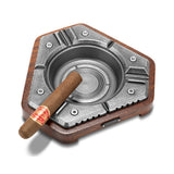 Silver hexagon cigar ashtray with cigar