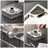 Silver cube ashtray detail collage showing glossy finish, cigarette rests, and geometric block design