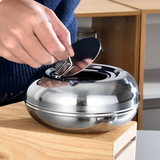 Hand lifting stainless steel ashtray lid using center handle
