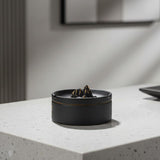 black ceramic ashtray with lid minimalist modern ashtray indoor setting