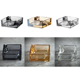 Set of three glass square ashtrays in different colors 