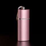 Rose portable metal pocket ashtray with lid and clip on black background