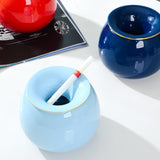 light blue ashtray with funnel lid close up modern ceramic design