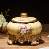Yellow gold vintage floral ceramic ashtray with lid and ornate bronze base