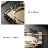 Crystal ashtray groove detail for cigarette square glass design close up