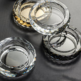 Multiple round glass ashtrays clear and gold colors modern display