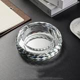 Silver crystal glass ashtray round heavy thick glass close up
