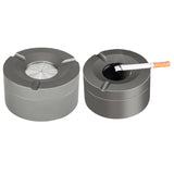 Outdoor ashtray with rotatable lid showing open and closed positions in stainless steel
